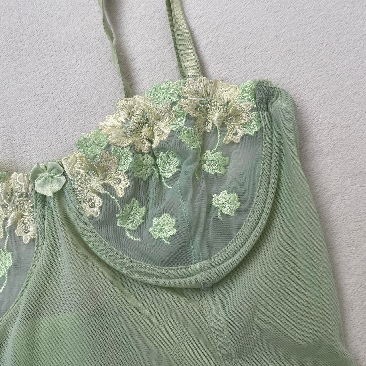 Green corset top with floral cups