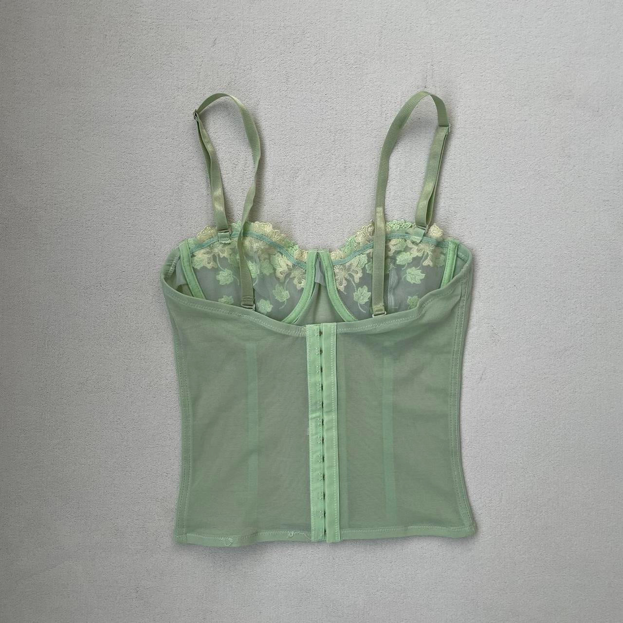 Green corset top with floral cups